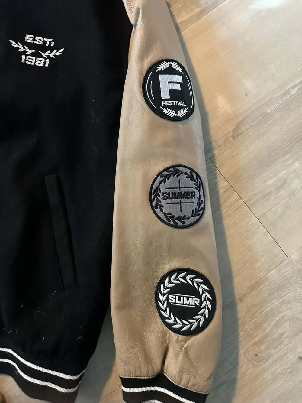 ASOS DESIGN Varsity Jacket with Patches and Faux Leather Sleeves